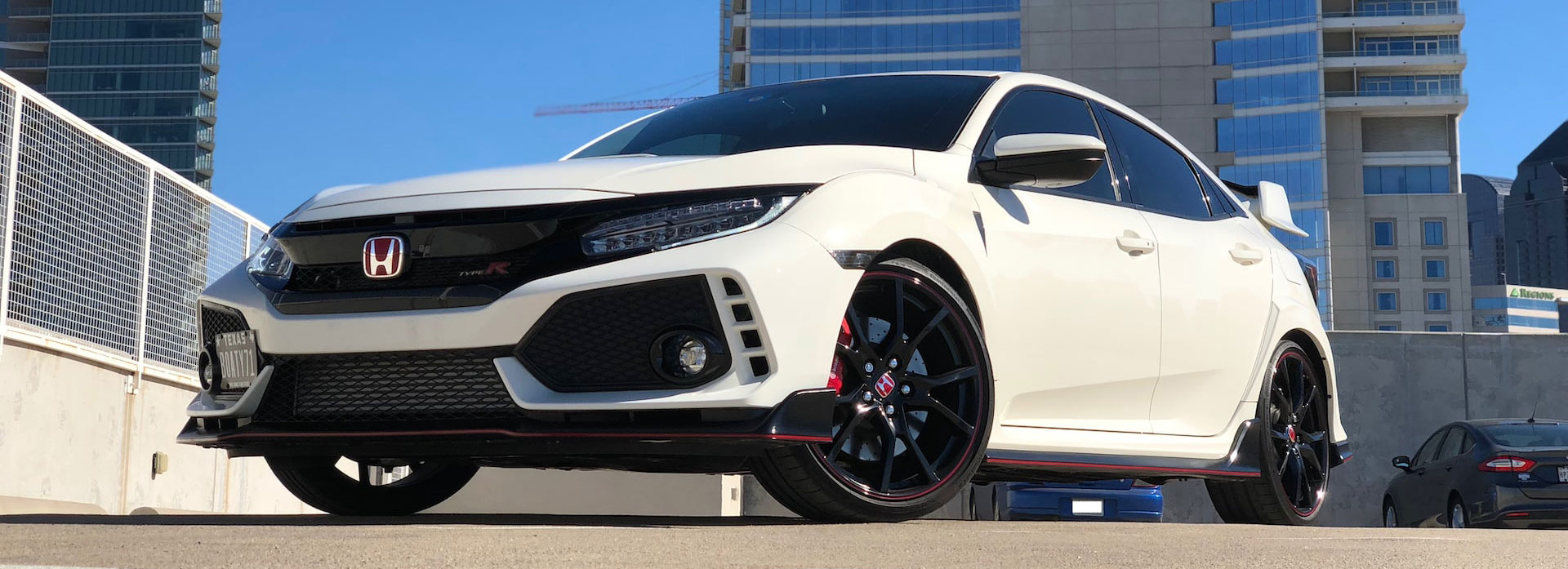 White honda civic in car park