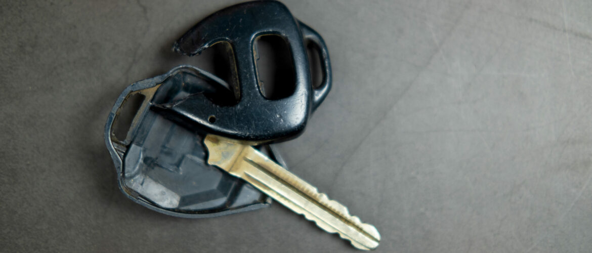 Close up dirty broken or damaged car remote key broken car key - Common Ways Car Keys Are Lost or Broken